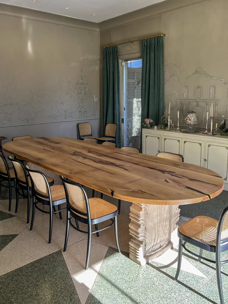 Custom dining table in San Antonio home by Green Wood Milling Co.