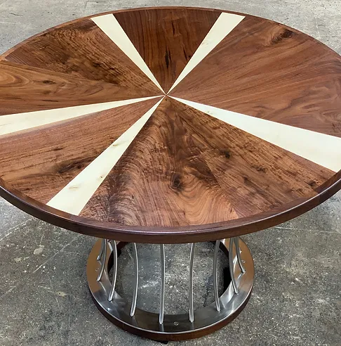 Custom round pie-wedge dining table with steel pedestal base — handcrafted in San Antonio, TX