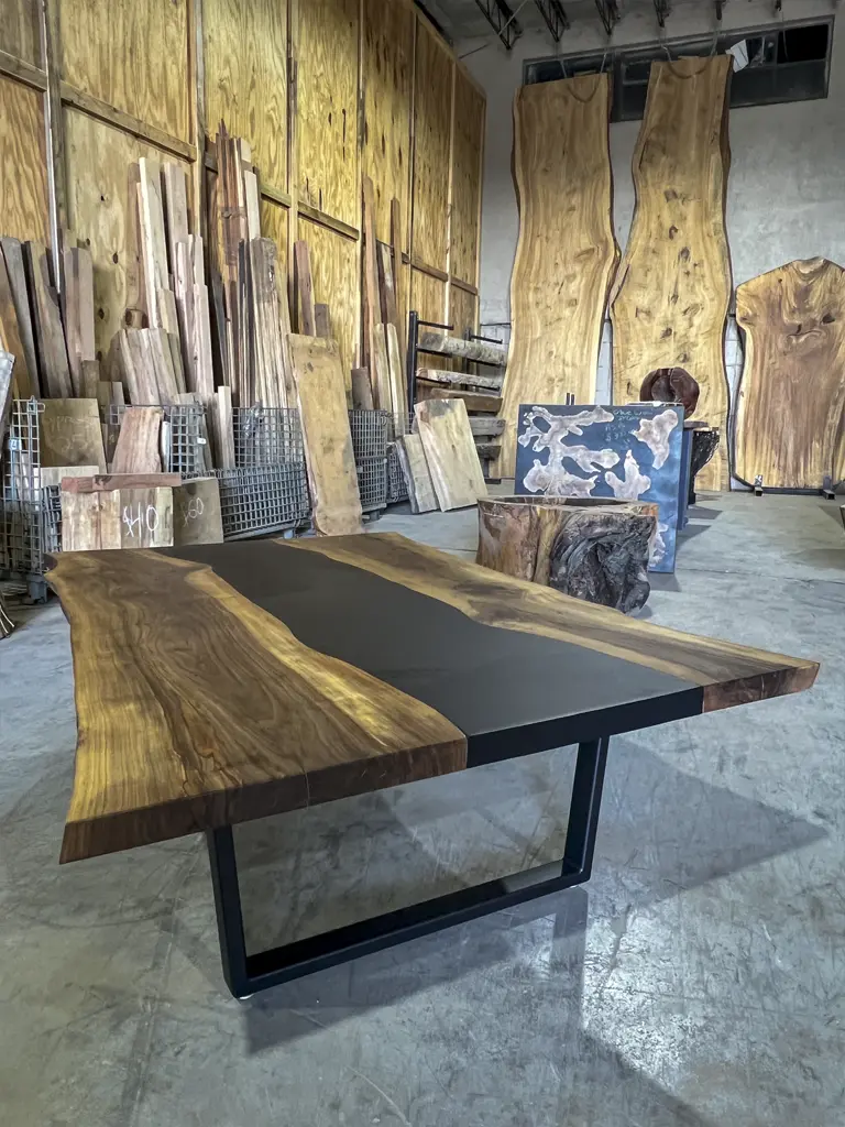 Epoxy river table built by San Antonio sawmill Green Wood Milling Co.